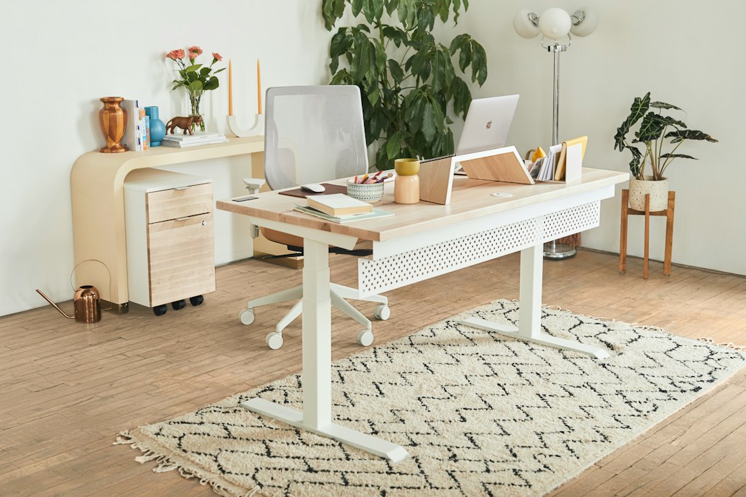 Representative ergonomic laptop stand on a desk